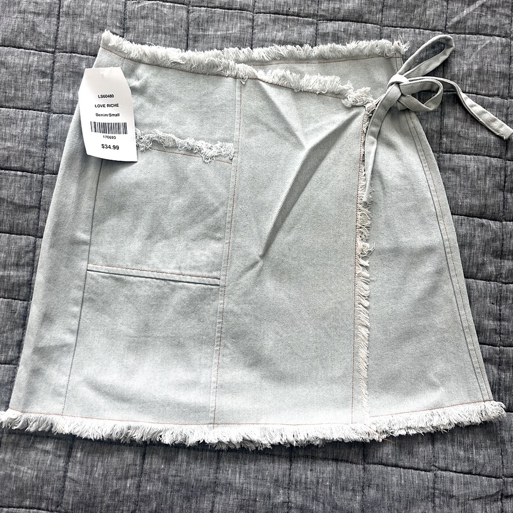 Dress Up Jean Skirt. Never worn & NWT. Size small.